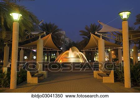 "Fountain in a park at dusk, Al Ain, Abu Dhabi, United Arab Emirates, Asia" View Large Photo Image Stock Image - "Fountain in a park at dusk, Al Ain, Abu Dhabi, United Arab Emirates, Asia". Fotosearch