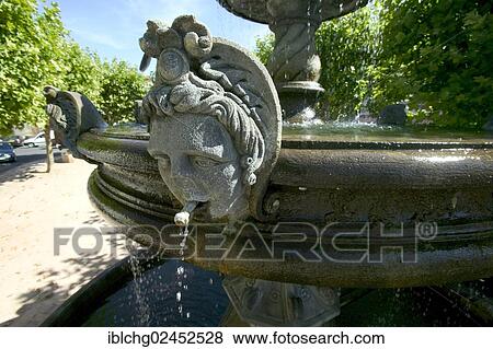 Stock Photo - "Fountain with Volvic stone statues, Billom, Puy de Dome, Auvergne, France, Europe". Fotosearch