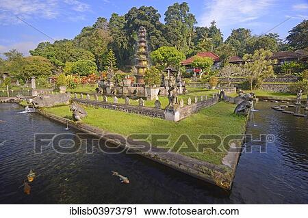 "Fountains and water basins at the Tirta Gangga Water Temple, Bali, Indonesia, Asia" View Large Photo Image Stock Image - "Fountains and water basins at the Tirta Gangga Water Temple, Bali, Indonesia, Asia". Fotosearch