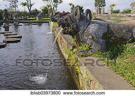 "Fountains and water basins at the Tirta Gangga Water Temple, Bali, Indonesia, Asia" View Large Photo Image Stock Image - "Fountains and water basins at the Tirta Gangga Water Temple, Bali, Indonesia, Asia". Fotosearch