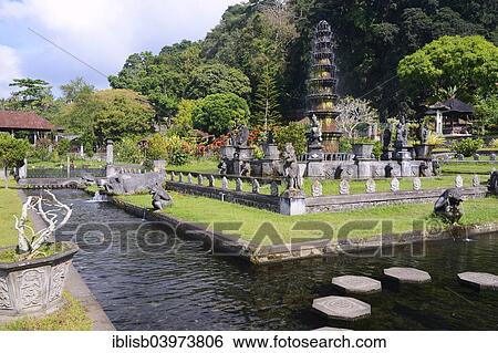 "Fountains and water basins at the Tirta Gangga Water Temple, Bali, Indonesia, Asia" View Large Photo Image Stock Photograph - "Fountains and water basins at the Tirta Gangga Water Temple, Bali, Indonesia, Asia". Fotosearch