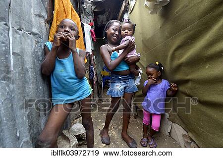 "Four children in the entrance of a shack, Camp Icare for earthquake refugees, Fort National, Port-au-Prince, Haiti, North America" View Large Photo Image Stock Photo - "Four children in the entrance of a shack, Camp Icare for earthquake refugees, Fort National, Port-au-Prince, Haiti, North America". Fotosearch