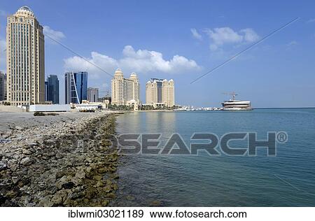 "Four Seasons Hotel, Falcon and Pearl Towers, Doha Hilton Hotel, Doha, Doha, Qatar, Asia" View Large Photo Image Stock Photo - "Four Seasons Hotel, Falcon and Pearl Towers, Doha Hilton Hotel, Doha, Doha, Qatar, Asia". Fotosearch