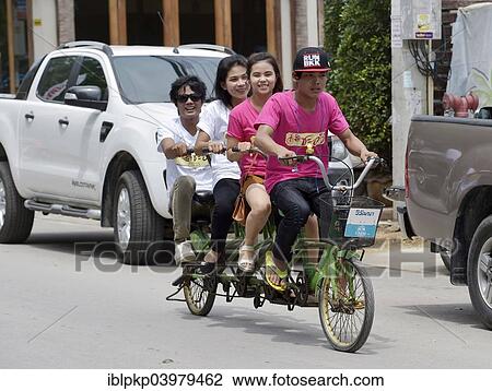 "Four teenagers riding a tandem, Cha Am, Thailand, Asia" View Large Photo Image Stock Image - "Four teenagers riding a tandem, Cha Am, Thailand, Asia". Fotosearch