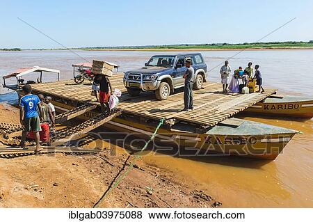 Stock Photo - "Four wheel drive car on a ferry, near Belon'i Tsiribihina, Morondava, Toliara province, Madagascar, Africa". Fotosearch