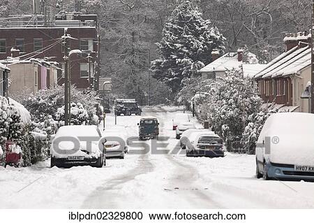 Four wheel drive vehicles move on a snow covered road when saloon cars stay parked for the day View Large Photo Image Stock Image - Four wheel drive vehicles move on a snow covered road when saloon cars stay parked for the day. Fotosearch