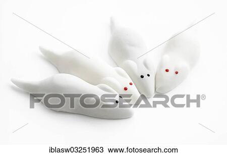 Stock Image - "Four white mice, foamy sugar sweets". Fotosearch