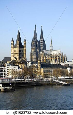 "Frankenwerft in winter, in the back the church Gross St. Martin and the Cologne Cathedral, old town on the Rhine river, Cologne, Rhineland, North Rhine-Westphalia, Germany, Europe" View Large Photo Image Stock Image - "Frankenwerft in winter, in the back the church Gross St. Martin and the Cologne Cathedral, old town on the Rhine river, Cologne, Rhineland, North Rhine-Westphalia, Germany, Europe". Fotosearch