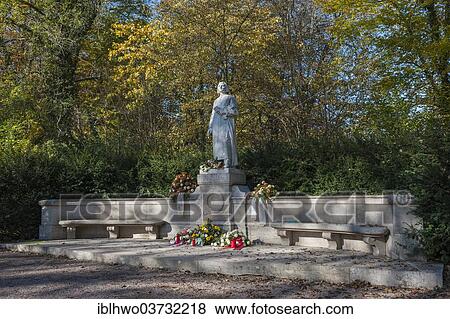 Stock Photo - "Franz Liszt Memorial, marble statue on a pedestal, next to benches and garlands, in Park an der Ilm park, Weimar, Thuringia, Germany, Europe". Fotosearch