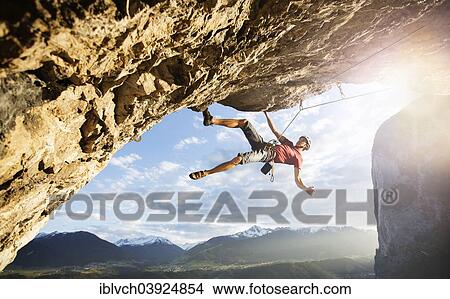 "Freeclimber with helmet climbing on a rock face, Martinswand, gallery, Innsbruck, Tyrol, Austria, Europe" View Large Photo Image Picture - "Freeclimber with helmet climbing on a rock face, Martinswand, gallery, Innsbruck, Tyrol, Austria, Europe". Fotosearch