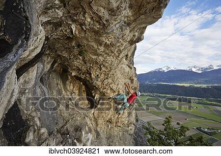 "Freeclimber with helmet climbing on a rock face, Martinswand, gallery, Innsbruck, Tyrol, Austria, Europe" View Large Photo Image Stock Image - "Freeclimber with helmet climbing on a rock face, Martinswand, gallery, Innsbruck, Tyrol, Austria, Europe". Fotosearch
