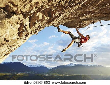 "Freeclimber with helmet climbing on a rock face, Martinswand, gallery, Innsbruck, Tyrol, Austria, Europe" View Large Photo Image Stock Image - "Freeclimber with helmet climbing on a rock face, Martinswand, gallery, Innsbruck, Tyrol, Austria, Europe". Fotosearch