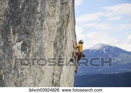 "Freeclimber with helmet climbing on a rock face, Martinswand, gallery, Innsbruck, Tyrol, Austria, Europe" View Large Photo Image Stock Photograph - "Freeclimber with helmet climbing on a rock face, Martinswand, gallery, Innsbruck, Tyrol, Austria, Europe". Fotosearch