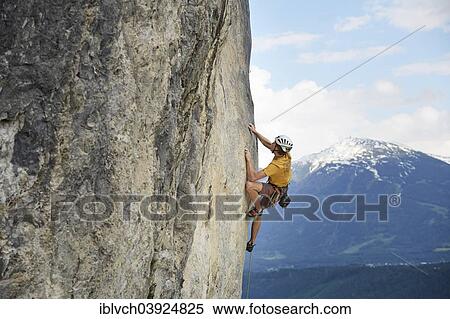 "Freeclimber with helmet climbing on a rock face, Martinswand, gallery, Innsbruck, Tyrol, Austria, Europe" View Large Photo Image Stock Photography - "Freeclimber with helmet climbing on a rock face, Martinswand, gallery, Innsbruck, Tyrol, Austria, Europe". Fotosearch