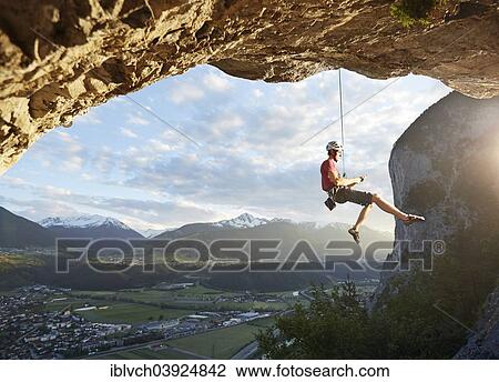 "Freeclimber with helmet sits in the rope, Martinswand, gallery, Innsbruck, Tyrol, Austria, Europe" View Large Photo Image Stock Image - "Freeclimber with helmet sits in the rope, Martinswand, gallery, Innsbruck, Tyrol, Austria, Europe". Fotosearch