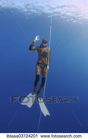 "Freediver wearing swimfins, making the gesture """"OK"""", Kas, Lycia, Province of Antalya, Turkey, Asia" View Large Photo Image Stock Image - "Freediver wearing swimfins, making the gesture """"OK"""", Kas, Lycia, Province of Antalya, Turkey, Asia". Fotosearch