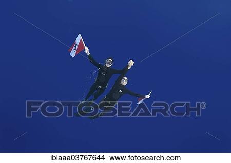 Picture - "Freedivers holding a diver down flag, Aegean Sea, Greece, Europe". Fotosearch
