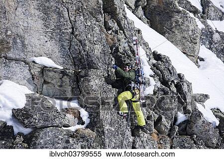 "Freeride skier ascending the Winterklettersteig climbing route, Arlberg, Verwall Group, North Tyrol, Austria, Europe" View Large Photo Image Stock Photography - "Freeride skier ascending the Winterklettersteig climbing route, Arlberg, Verwall Group, North Tyrol, Austria, Europe". Fotosearch