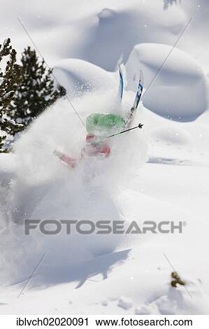Stock Image - "Freerider, skier flipping, snowy landscape, northern Tyrol, Austria, Europe". Fotosearch