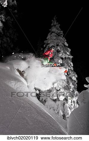 Stock Photo - "Freerider, skier jumping, snowy landscape, northern Tyrol, Austria, Europe". Fotosearch
