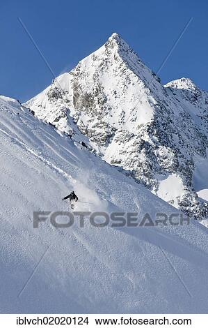 Picture - "Freerider snowboarding in deep snow, Stubai Glacier, North Tyrol, Austria, Europe". Fotosearch