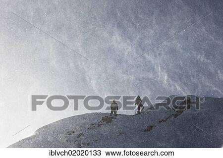 "Freeriders in an area with deep snow during a snowstorm, Stubai Glacier, North Tyrol, Austria, Europe" View Large Photo Image Stock Image - "Freeriders in an area with deep snow during a snowstorm, Stubai Glacier, North Tyrol, Austria, Europe". Fotosearch
