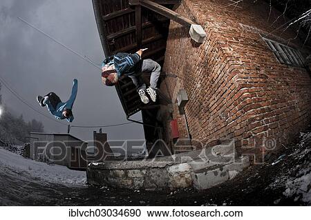 "Freerunners doing somersaults at an old industrial site, Schwaz, Tyrol, Austria, Europe" View Large Photo Image Stock Image - "Freerunners doing somersaults at an old industrial site, Schwaz, Tyrol, Austria, Europe". Fotosearch