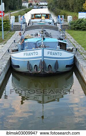 Stock Photo - "Freighter Franto on the Canal des Vosges, formerly Canal de l'Est, last southern lock on the canal, lock No. 46, Corre, Vesoul, Haute-Saone, Franche-Comte, France, Europe". Fotosearch
