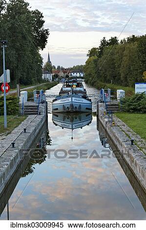 "Freighter Franto on the Canal des Vosges, formerly Canal de l'Est, last southern lock on the canal, lock No. 46, Corre, Vesoul, Haute-Saone, Franche-Comte, France, Europe" View Large Photo Image Stock Photography - "Freighter Franto on the Canal des Vosges, formerly Canal de l'Est, last southern lock on the canal, lock No. 46, Corre, Vesoul, Haute-Saone, Franche-Comte, France, Europe". Fotosearch