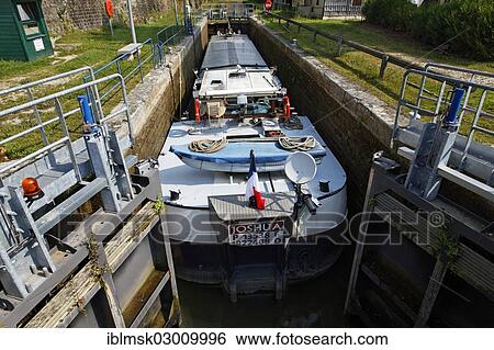 "Freighter Joshua at lock No. 41, Canal des Vosges, formerly Canal de l'Est, Fontenoy-le-Chateau, Epinal, Lorraine, Departement Vosges, France, Europe" View Large Photo Image Stock Photograph - "Freighter Joshua at lock No. 41, Canal des Vosges, formerly Canal de l'Est, Fontenoy-le-Chateau, Epinal, Lorraine, Departement Vosges, France, Europe". Fotosearch
