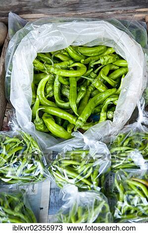 "Fresh green chilis on sale at the market in plastic bags, Turkey, Asia" View Large Photo Image Stock Image - "Fresh green chilis on sale at the market in plastic bags, Turkey, Asia". Fotosearch