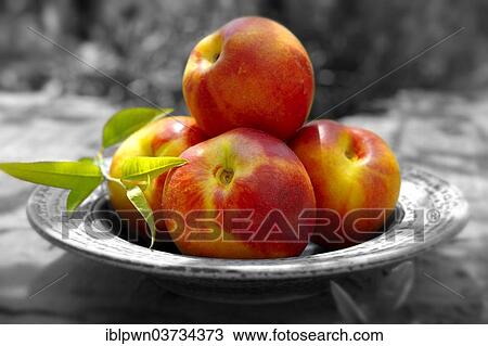 Stock Image - Fresh nectarines. Fotosearch