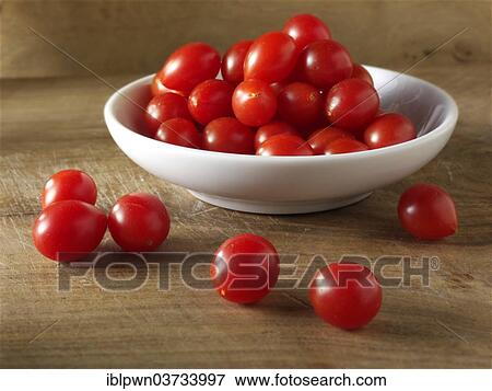 Stock Photo - Fresh Tom Tom tomatoes. Fotosearch
