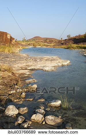 "Fresh water spring in a canyon at Palmwag, Kunene Region, Namibia, Africa" View Large Photo Image Stock Photo - "Fresh water spring in a canyon at Palmwag, Kunene Region, Namibia, Africa". Fotosearch