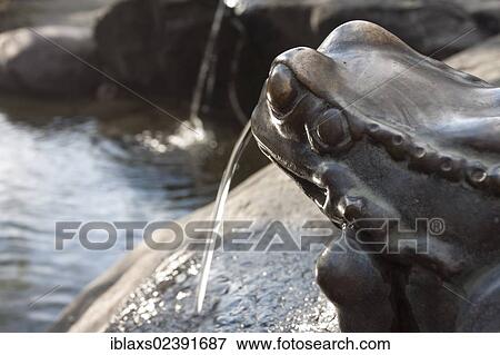 Stock Photo - "Frog fountain on the island of Mainau, Baden-Wuerttemberg, Germany, Europe". Fotosearch
