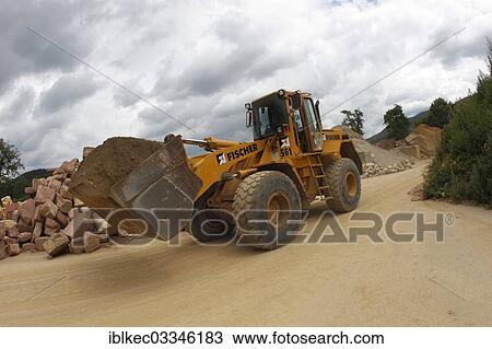 "Front end loader in a gravel pit, Bavaria, Germany, Europe" View Large Photo Image Stock Image - "Front end loader in a gravel pit, Bavaria, Germany, Europe". Fotosearch