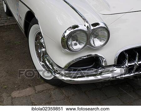 Stock Image - Front of an American Chevrolet Corvette with twin headlights. Fotosearch