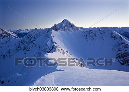 "Frozen north face of Reitherspitze Mountain at dusk, Reith bei Seefeld, Karwendel Mountains, Tyrol, Austria, Europe" View Large Photo Image Stock Photo - "Frozen north face of Reitherspitze Mountain at dusk, Reith bei Seefeld, Karwendel Mountains, Tyrol, Austria, Europe". Fotosearch
