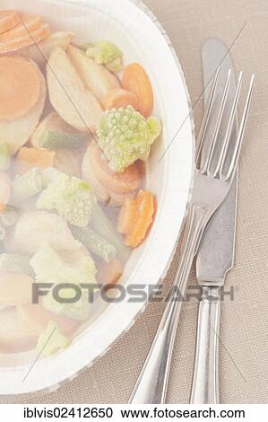 Frozen TV dinner with knife and fork View Large Photo Image Stock Image - Frozen TV dinner with knife and fork. Fotosearch