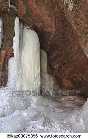 "Frozen waterfall inside a cave on the shore of Lake Superior, Apostle Islands National Lakeshore, Bayfield, Wisconsin, USA" View Large Photo Image Stock Photograph - "Frozen waterfall inside a cave on the shore of Lake Superior, Apostle Islands National Lakeshore, Bayfield, Wisconsin, USA". Fotosearch