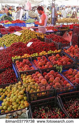 Stock Photo - "Fruit seller at the farmer's market, Manavgat, Antalya Province, Turkey, Asia". Fotosearch