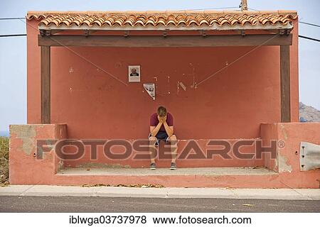 "Frustrated boy, 13, at a bus stop, Tenerife, Canary Islands, Spain, Europe" View Large Photo Image Stock Photo - "Frustrated boy, 13, at a bus stop, Tenerife, Canary Islands, Spain, Europe". Fotosearch