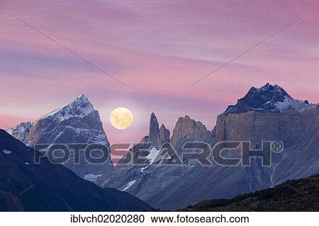 Stock Image - "Full moon over the mountains, Torres del Paine National Park, Patagonia region, Chile, South America". Fotosearch