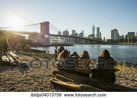 "Fulton Ferry State Park on the East River, the Brooklyn Bridge and Downtown Manhattan at the back, Dumbo, Down Under the Manhattan Bridge Overpass, New York, United States, North America" View Large Photo Image Stock Photo - "Fulton Ferry State Park on the East River, the Brooklyn Bridge and Downtown Manhattan at the back, Dumbo, Down Under the Manhattan Bridge Overpass, New York, United States, North America". Fotosearch