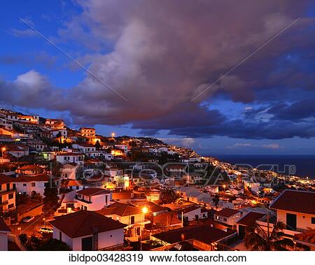 "Funchal cityscape at dusk with dark clouds looming overhead, Funchal, Madeira, Portugal, Europe" View Large Photo Image Stock Photo - "Funchal cityscape at dusk with dark clouds looming overhead, Funchal, Madeira, Portugal, Europe". Fotosearch
