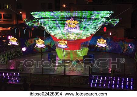 Picture - "Funfair ride, light traces, funfair at Port Hercule, Monaco, French Riviera, Europe". Fotosearch