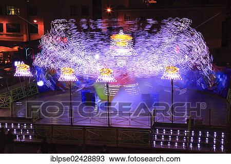 "Funfair ride, light traces, funfair at Port Hercule, Monaco, French Riviera, Europe" View Large Photo Image Stock Image - "Funfair ride, light traces, funfair at Port Hercule, Monaco, French Riviera, Europe". Fotosearch