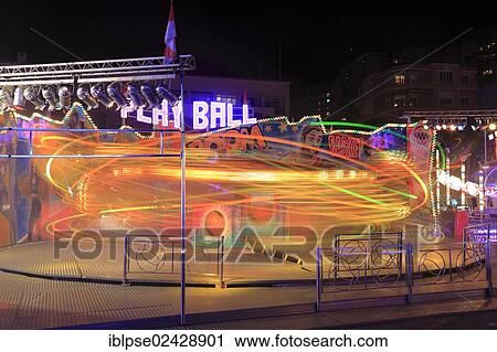 "Funfair ride, light traces, funfair at Port Hercule, Monaco, French Riviera, Europe" View Large Photo Image Stock Image - "Funfair ride, light traces, funfair at Port Hercule, Monaco, French Riviera, Europe". Fotosearch