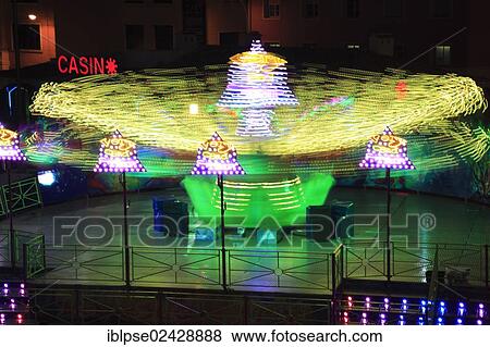 "Funfair ride, light traces, funfair at Port Hercule, Monaco, French Riviera, Europe" View Large Photo Image Stock Photo - "Funfair ride, light traces, funfair at Port Hercule, Monaco, French Riviera, Europe". Fotosearch