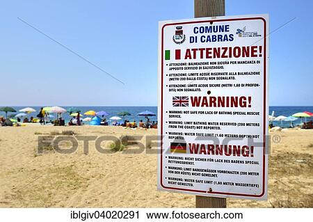 "Funny German translation on a warning sign on the beach, Sinis peninsula, Sardinia, Italy, Europe" View Large Photo Image Stock Image - "Funny German translation on a warning sign on the beach, Sinis peninsula, Sardinia, Italy, Europe". Fotosearch